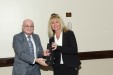 Dr. Nagib Callaos, General Chair, giving Prof. Suzanne Lunsford an award "In Appreciation for Delivering s Great Keynote Address at a Plenary Session."